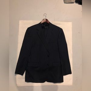 Jos A Bank men’s suit, navy with pinstripes, 43R. 37” waste.